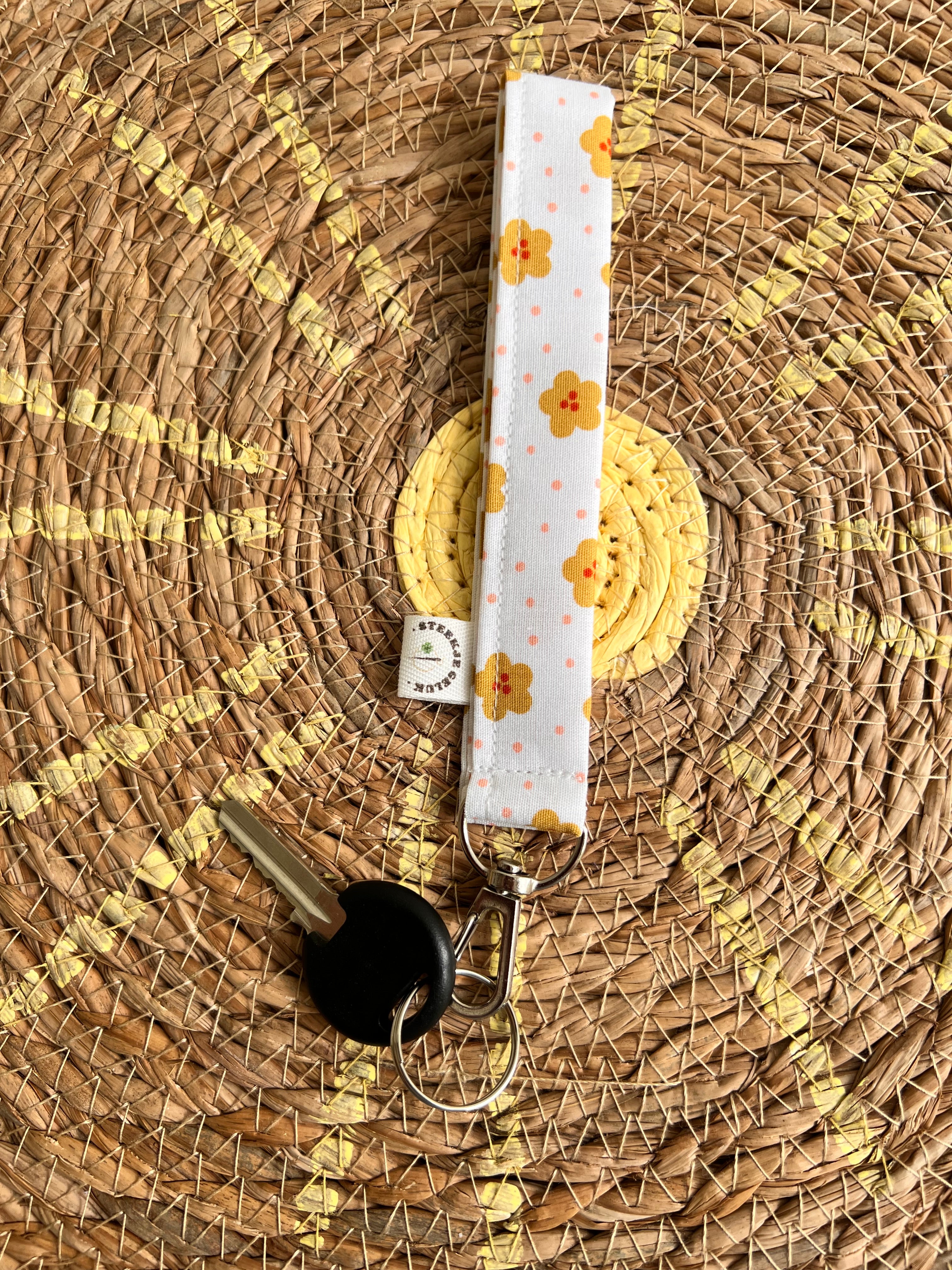 Sleutelhanger wit bloemetjes