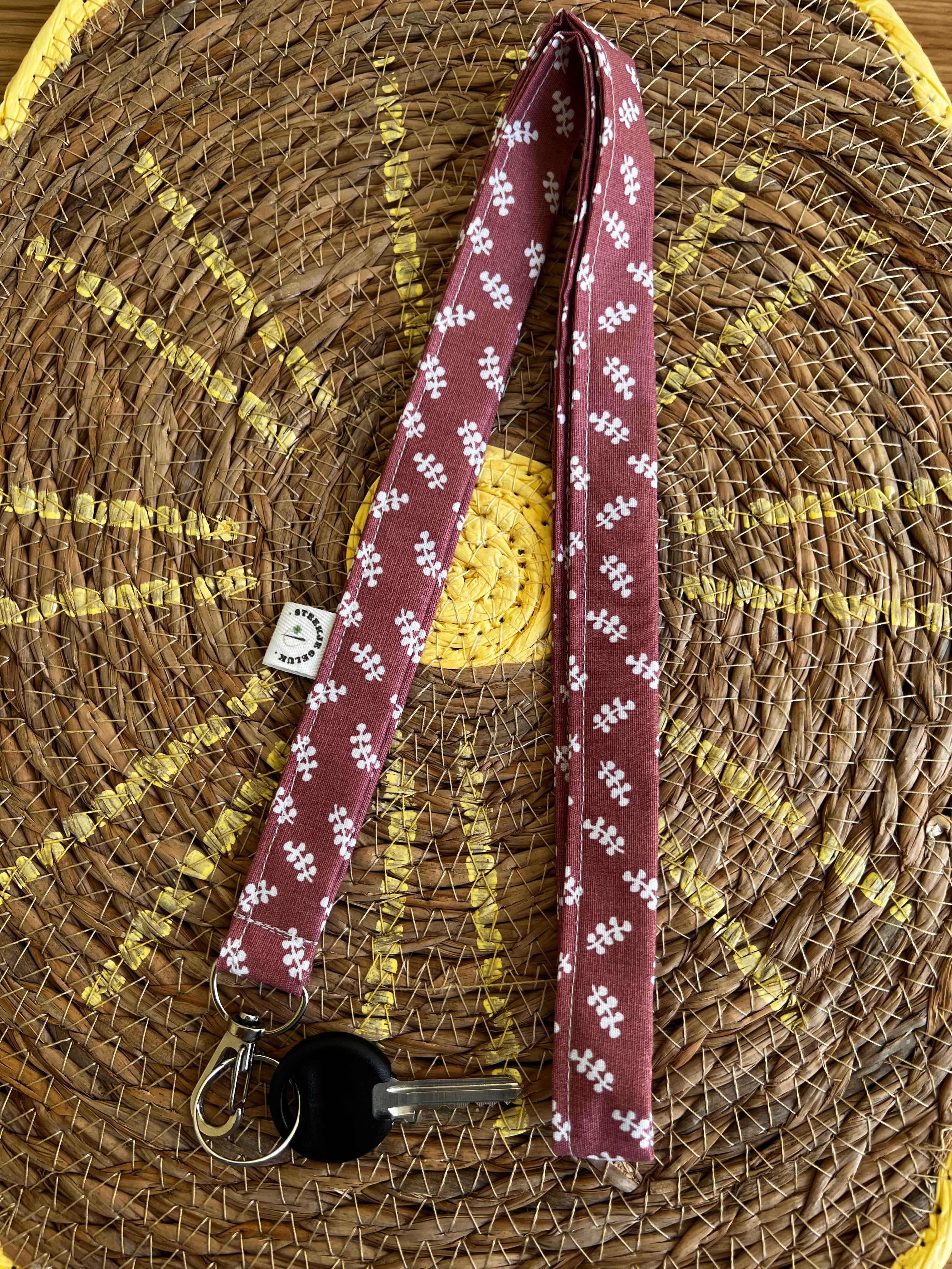 Keycord donker oudroze
