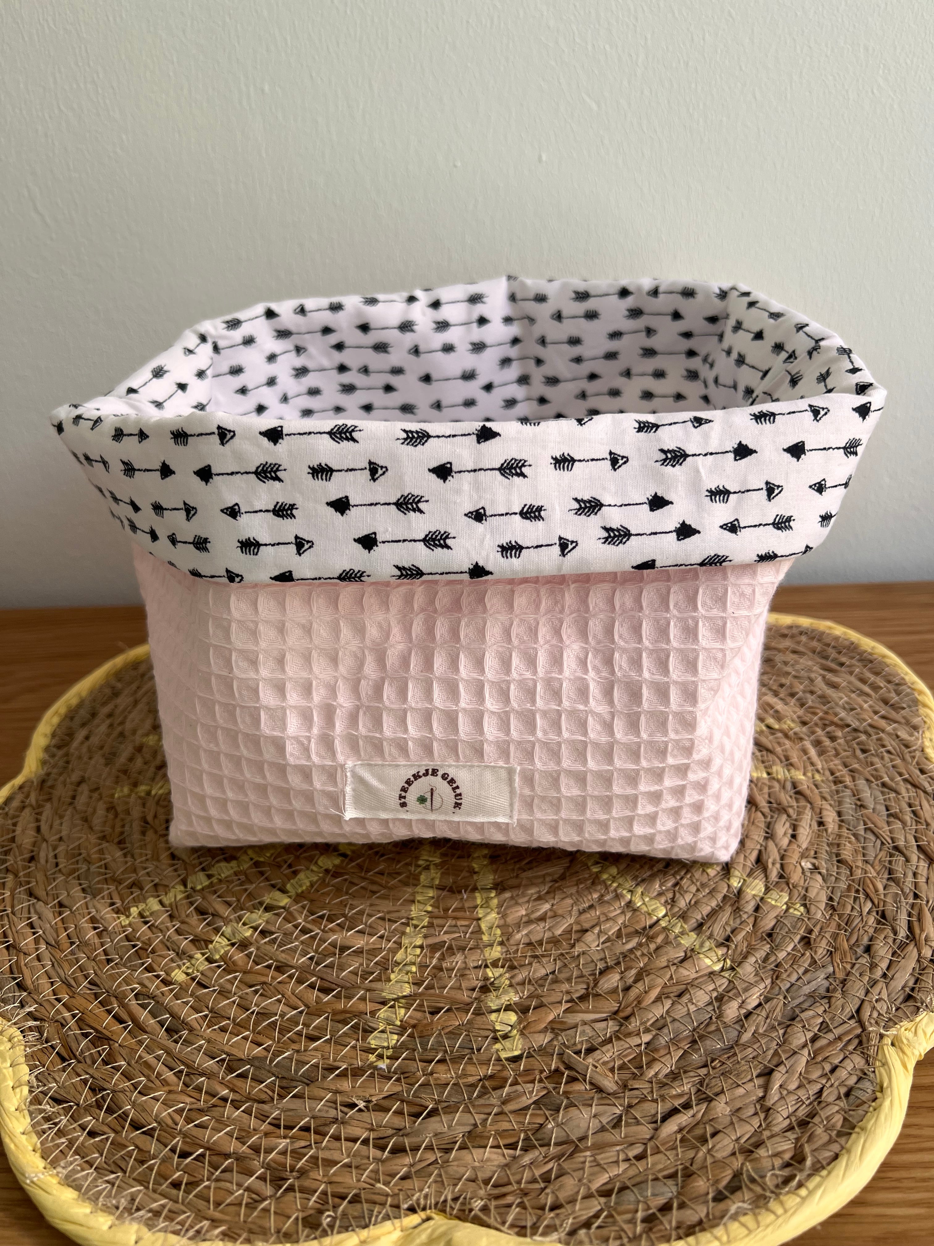 Bakjes roze pijl