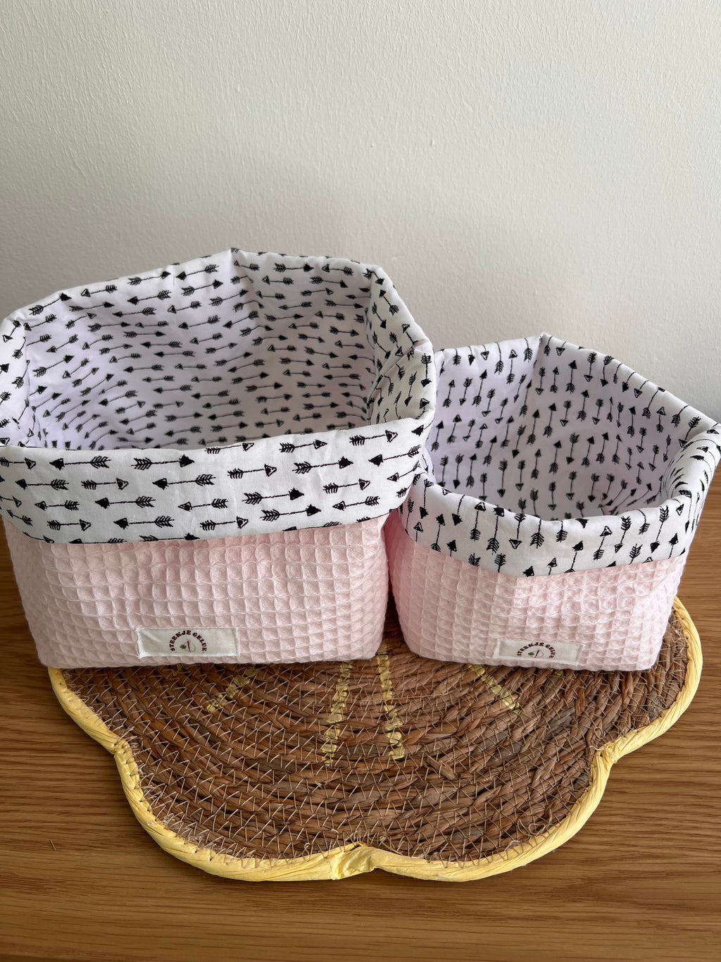Bakjes roze pijl