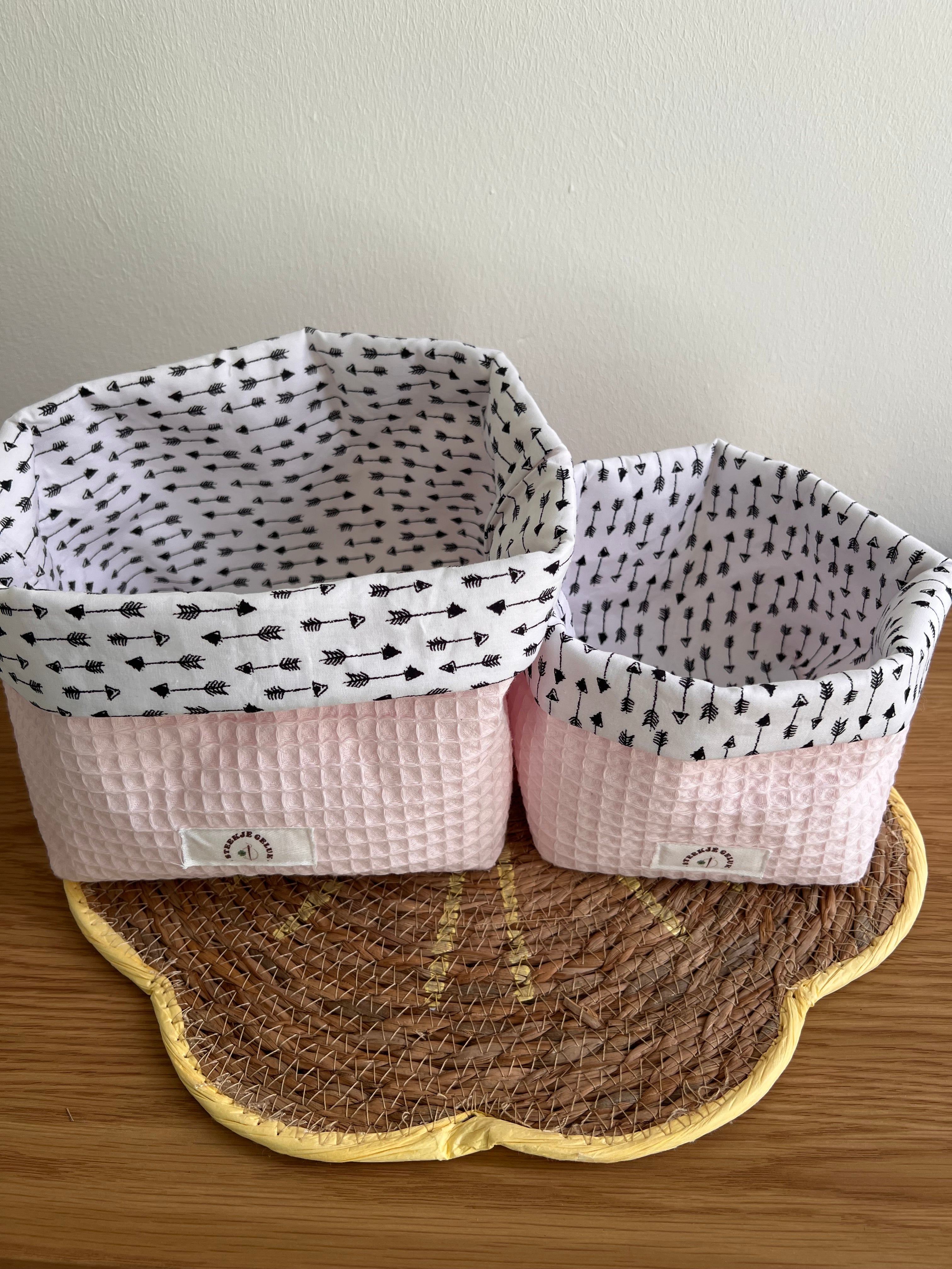 Bakjes roze pijl